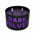 Dark Velvet candle front view, black tin with purple lettering