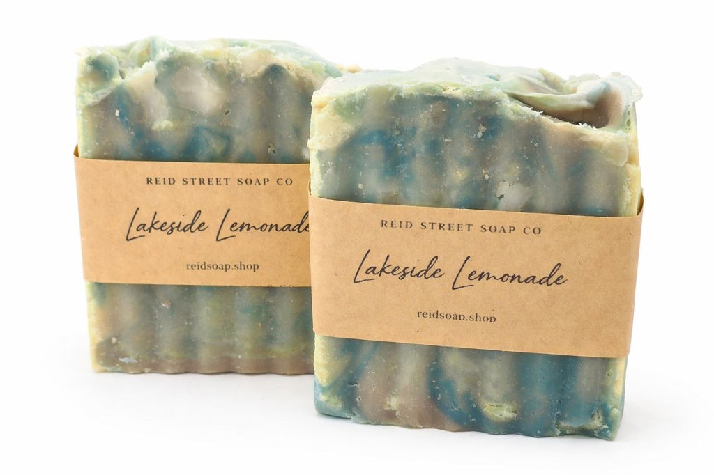 Two bars of 'Lakeside Lemonade' soap from Reid Street Soap Co on a white background